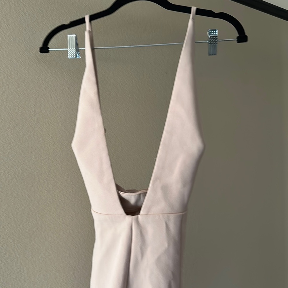 Very Marilyn Monroe; low cut jumpsuit by House London in size L. Designer.